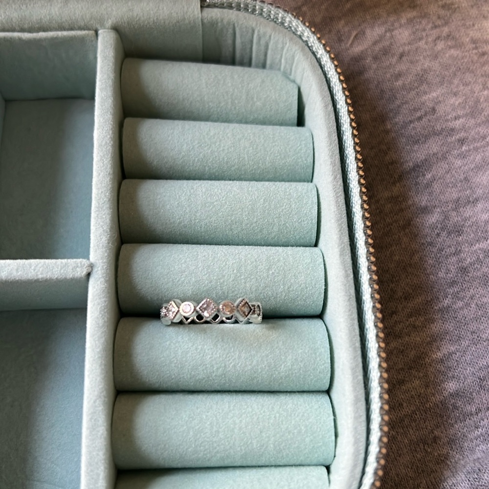 - Pandora eternity ring, size 4.5, round and square shaped eternity ring.